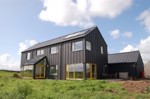 Gorgeous black zinc sheet creates modern twist to old-fashioned farmhouse